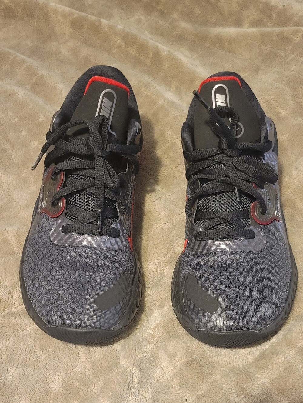 Nike Men’s Black Athletic Shoes with Red Accents